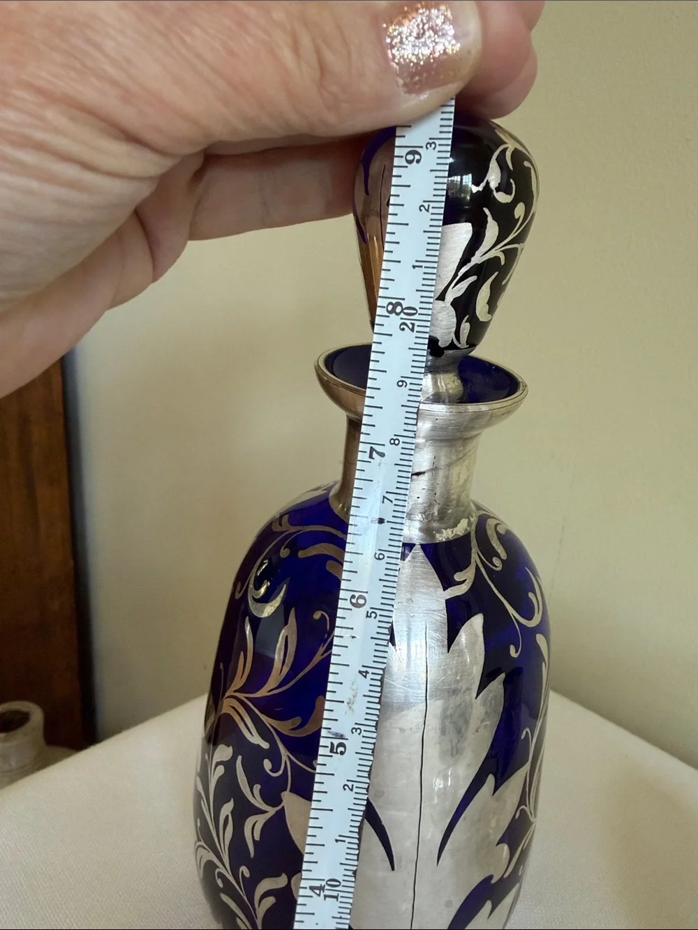 Cobalt blue glass with sterling silver over lay decanter.
